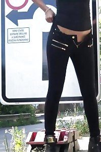 Magnificent Black-haired Pisses Outside On A Main Road