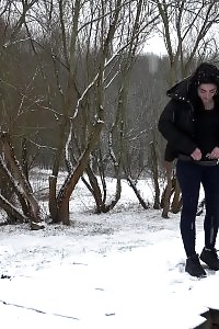 Black Haired Maid Pees On A Bridge In The Snow