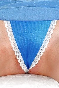 Fascinating Hostess Pulls Her Blue Sexypanties Off To Show Her Pussy
